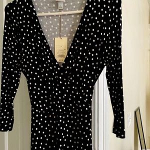 Black and white wrap dress. Never worn.